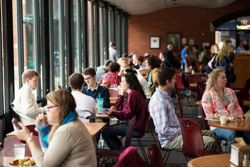 Students eating in the IDX Student Life Center at Champlain College